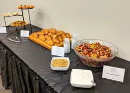 Croissant, yogurt, fruit and pastries for a breakfast catering event