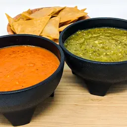 Green salsa, red salsa, and homemade tortilla chips for a wedding