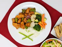 Teriyaki chicken, vegetables, and egg rolls catered in Riverside